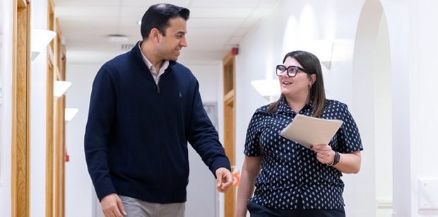 Staff walking with patient