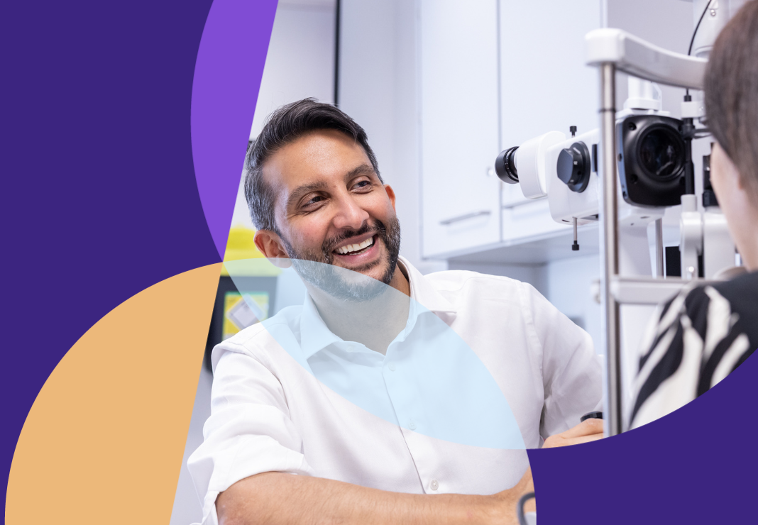 Consultant with patient doing an eye examination