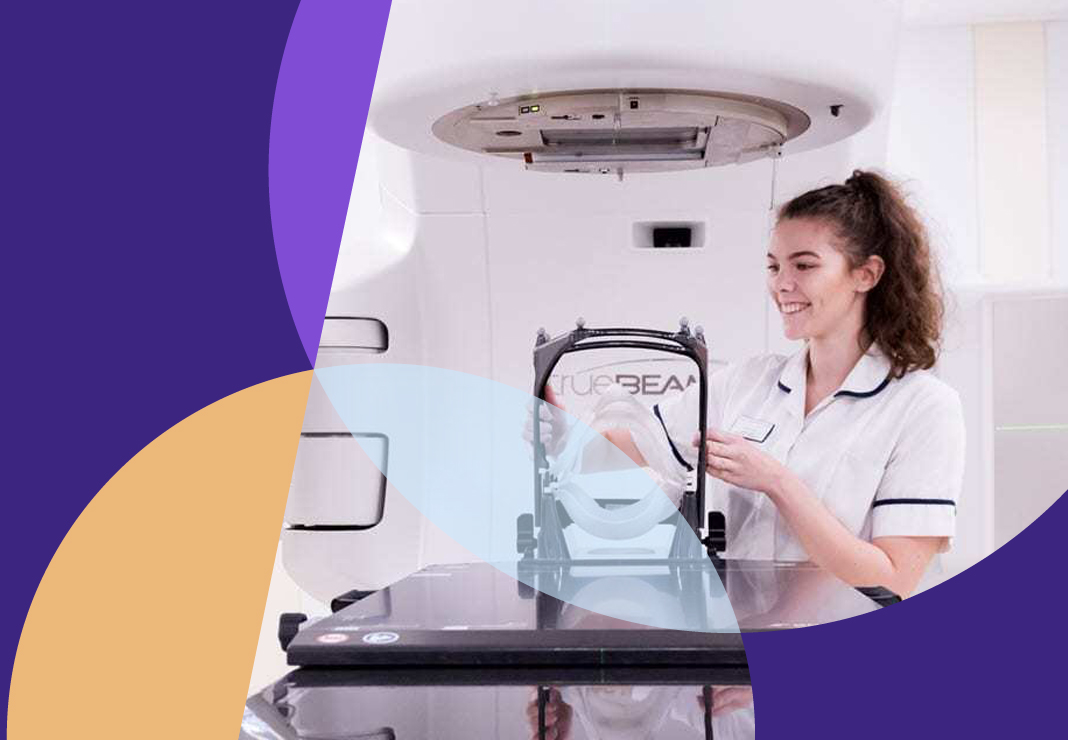 Nurse using a radiotherapy machine