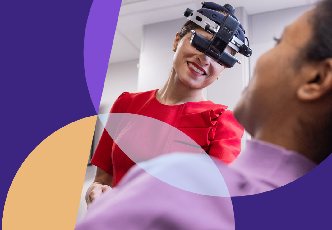 Ophthalmologist with patient examining their eyes with high tech tools