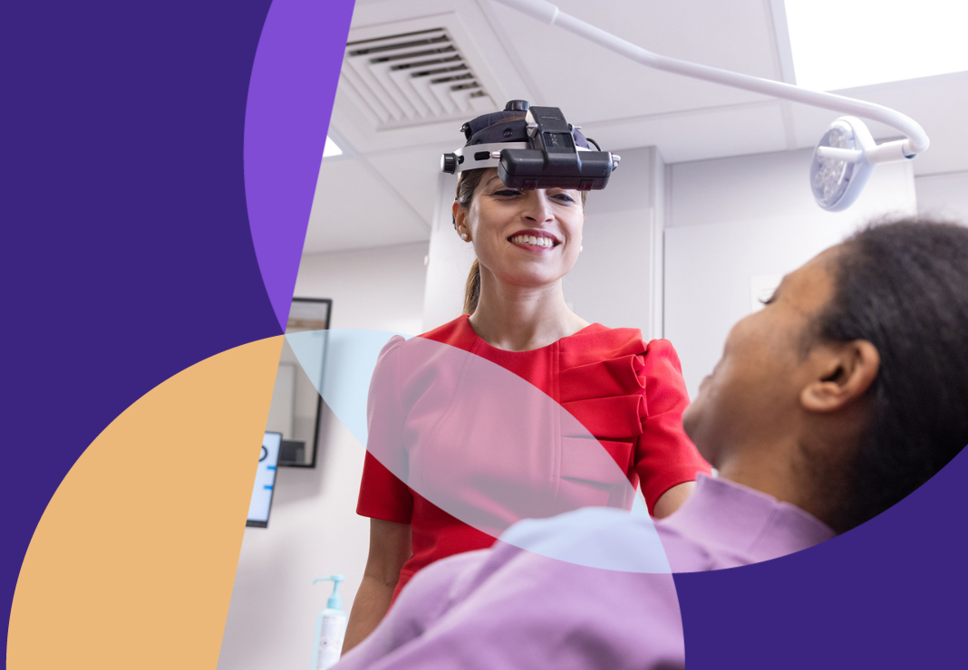 ophthalmologist with patient in examining room 