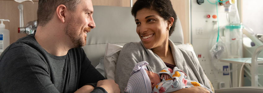 Couple with newborn baby